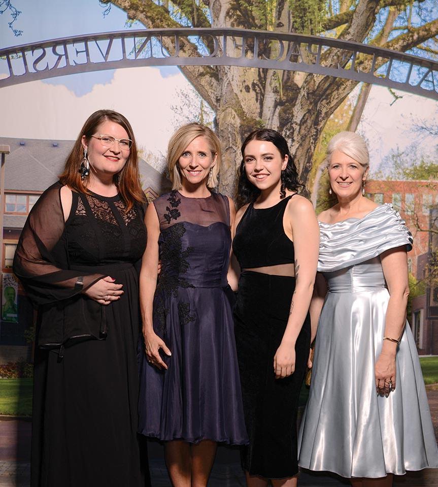 Left to right: Furrow, student designer Sarah Maberry, Pam Martin, and apparel design faculty member Sarah Mosher.